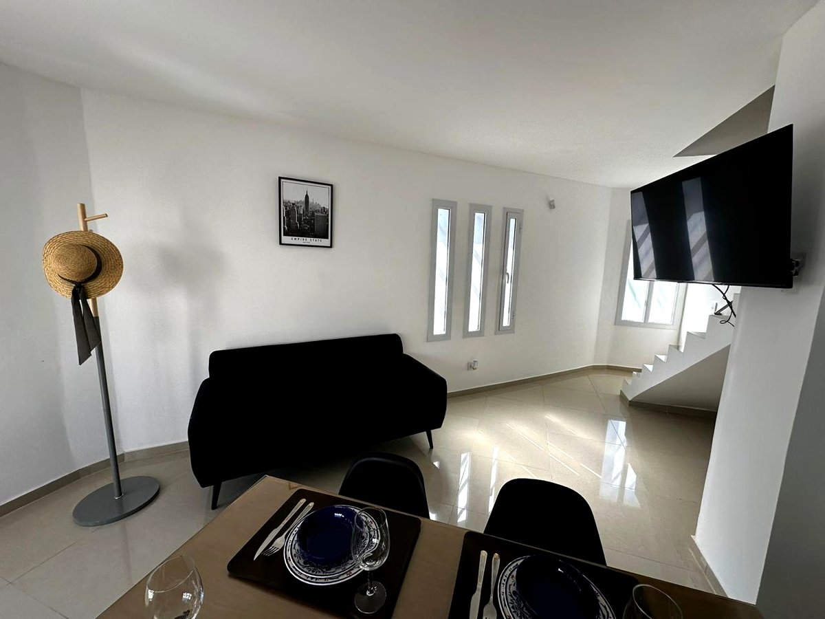 Living-comedor dúplex Cipolletti
